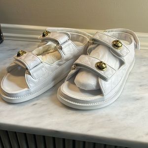 Dad sandals.  White excellent condition.   Never worn